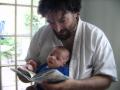 Image 2005-07/liam_reads_MrBrown_to_daddy.jpg